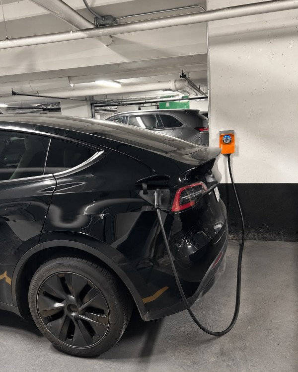 EV charger mounted on the interior wall of a residential home garage in the Greater Toronto Area